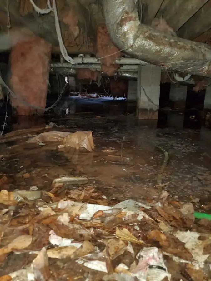 Crawl space flood assessment for Commercial Water Damage Restoration in Pike Creek Valley