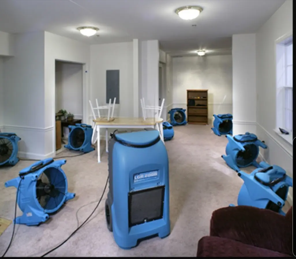 Air movers and dehumidifier setup for Water Damage Restoration in Pike Creek Valley